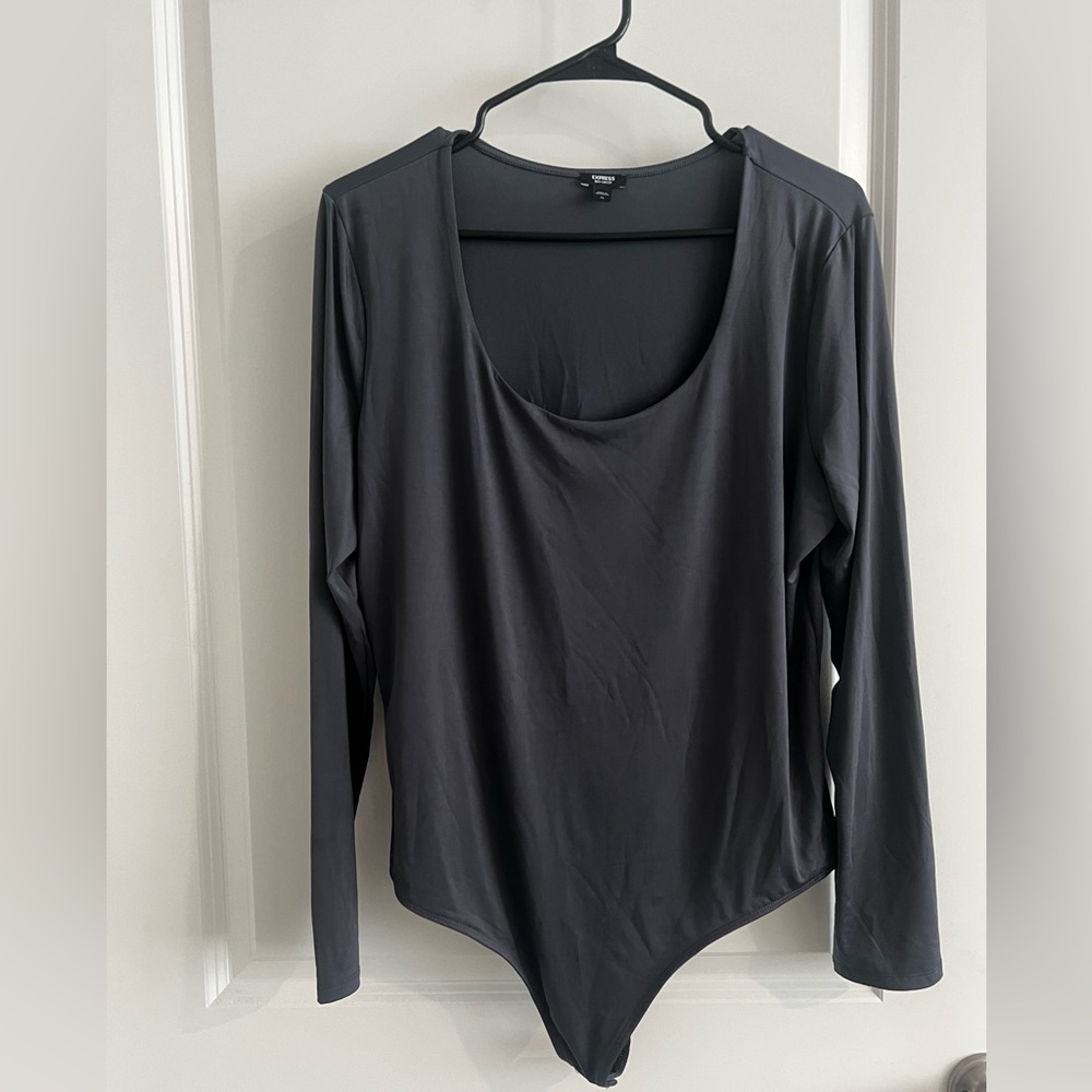 Dark gray express body suit Xl material is stretchy/silky